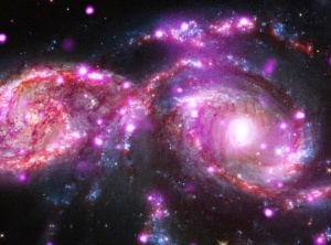 Galaxies spiral into each other, create spectacular light show (VIDEO, PHOTOS)